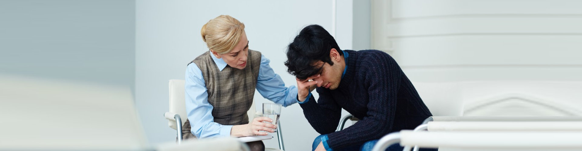 teen age boy consulting to a psychiatrist